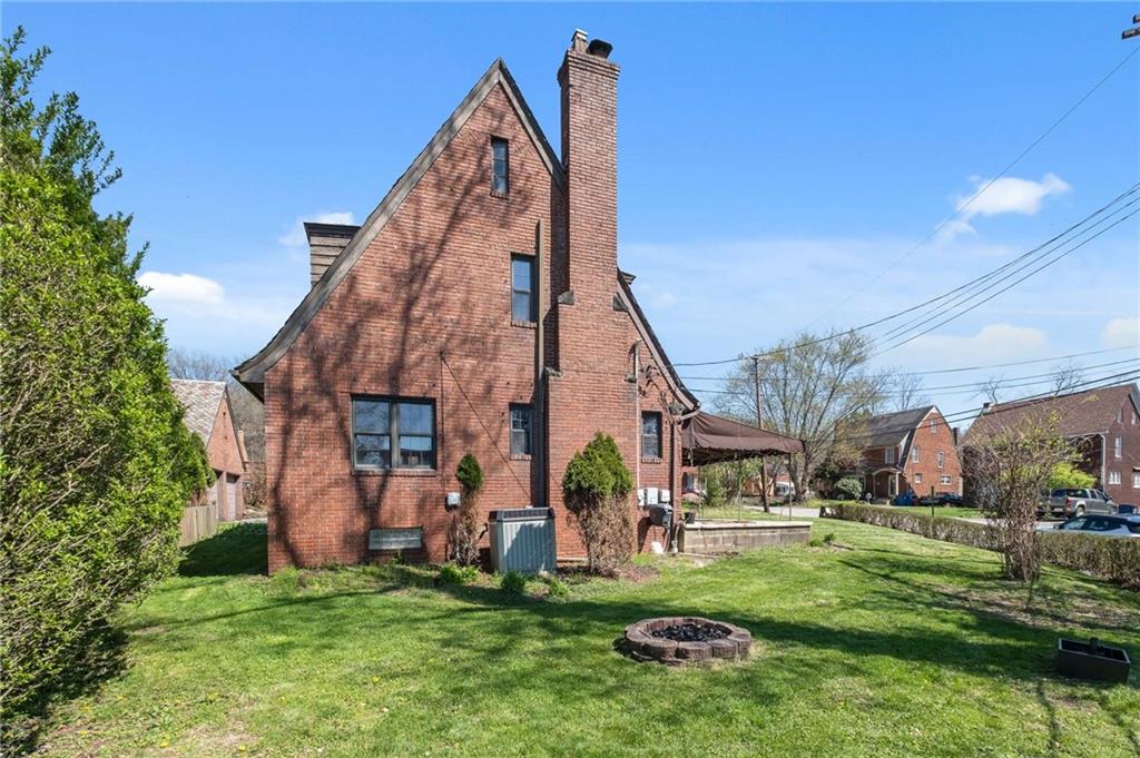 1516 Riverside Drive Verona, PA 15147 - Photo 35 of 38 a view of a house with a yard and deck