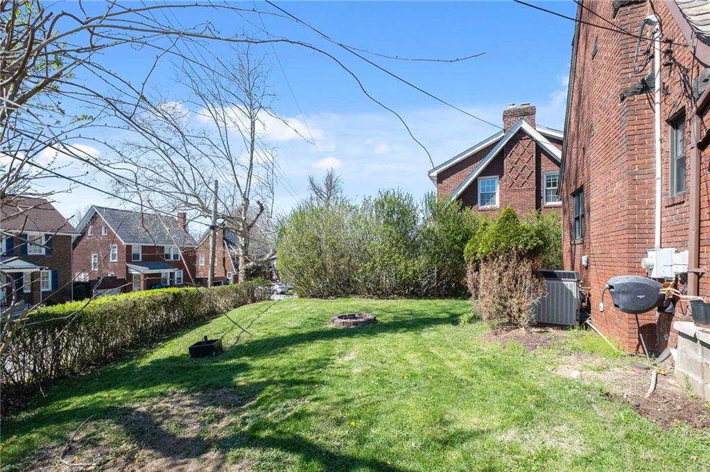 1516 Riverside Drive Verona, PA 15147 - Photo 36 of 38 a view of a chair and table in the backyard
