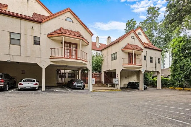 a car parked in front of a house