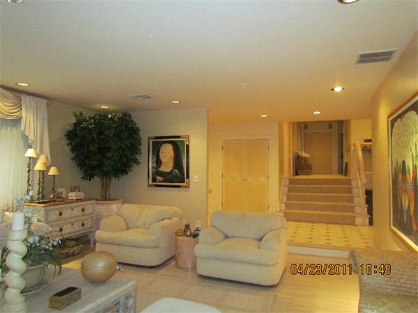 70 Farina Road Newton, MA 02459 - Photo 5 of 17 a living room with furniture and a painting on the wall
