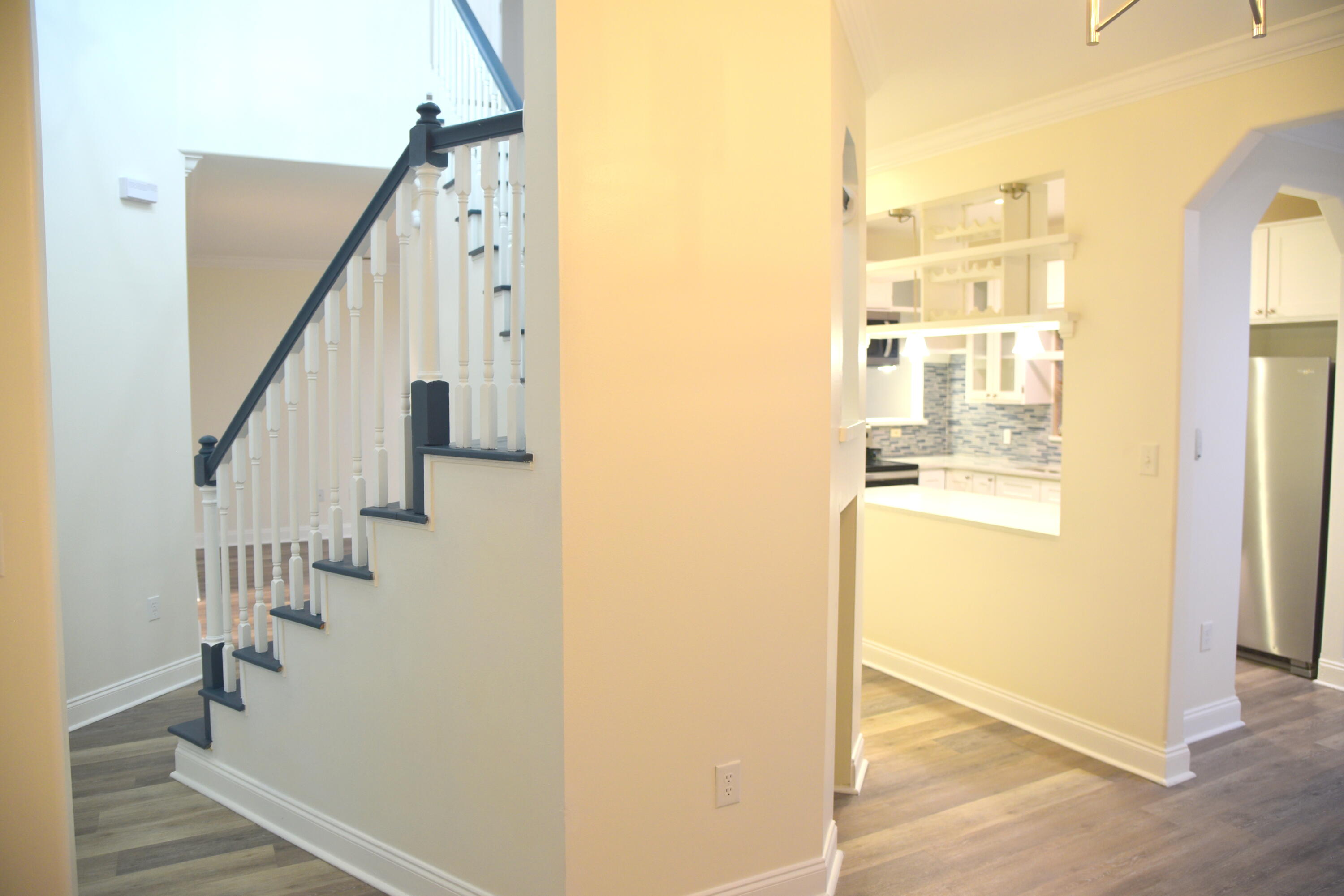149 Legion Park Loop Miramar Beach, FL 32550 - Photo 22 of 89 a view of a hallway with wooden floor and entryway