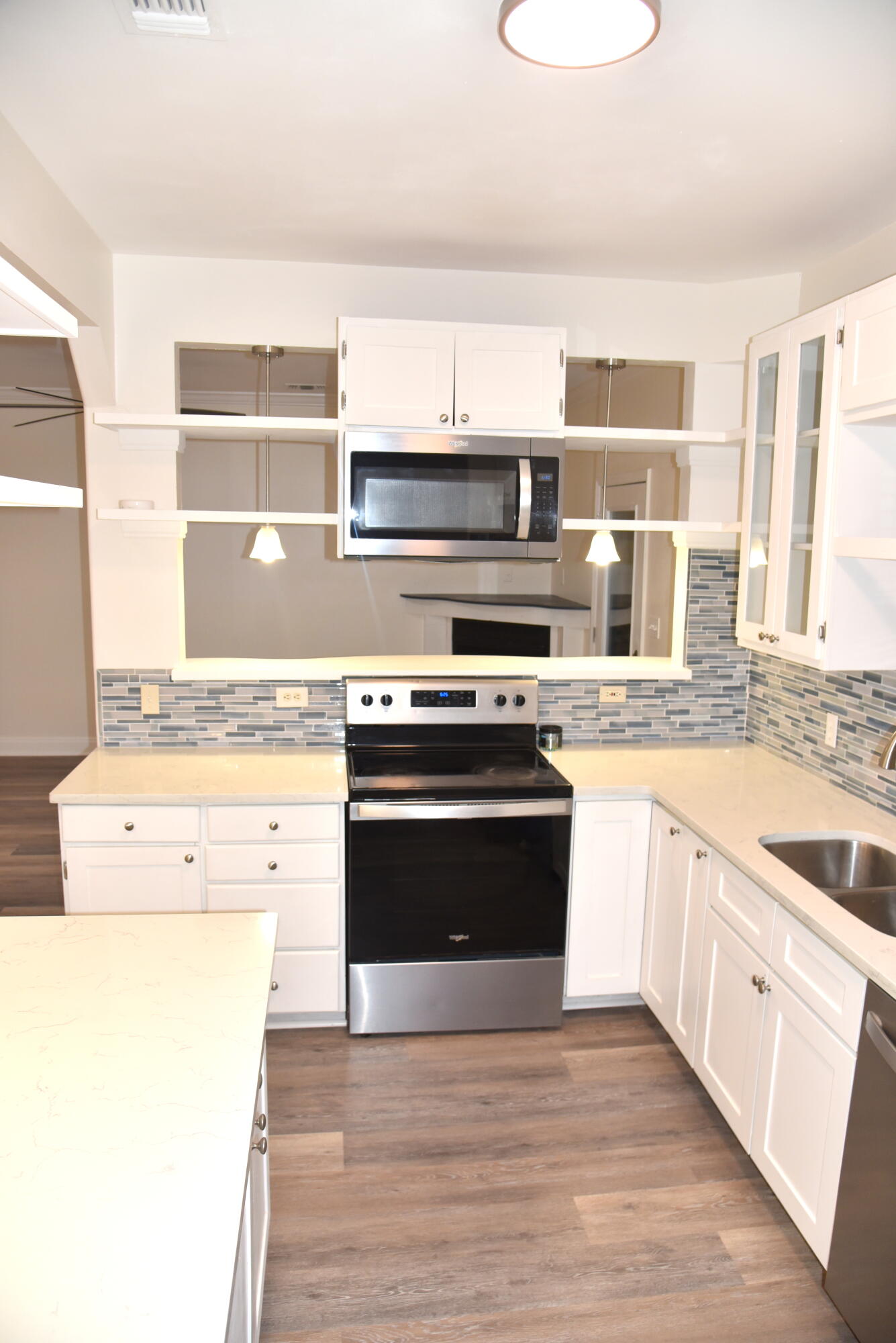 149 Legion Park Loop Miramar Beach, FL 32550 - Photo 25 of 89 a kitchen with a stove and a microwave