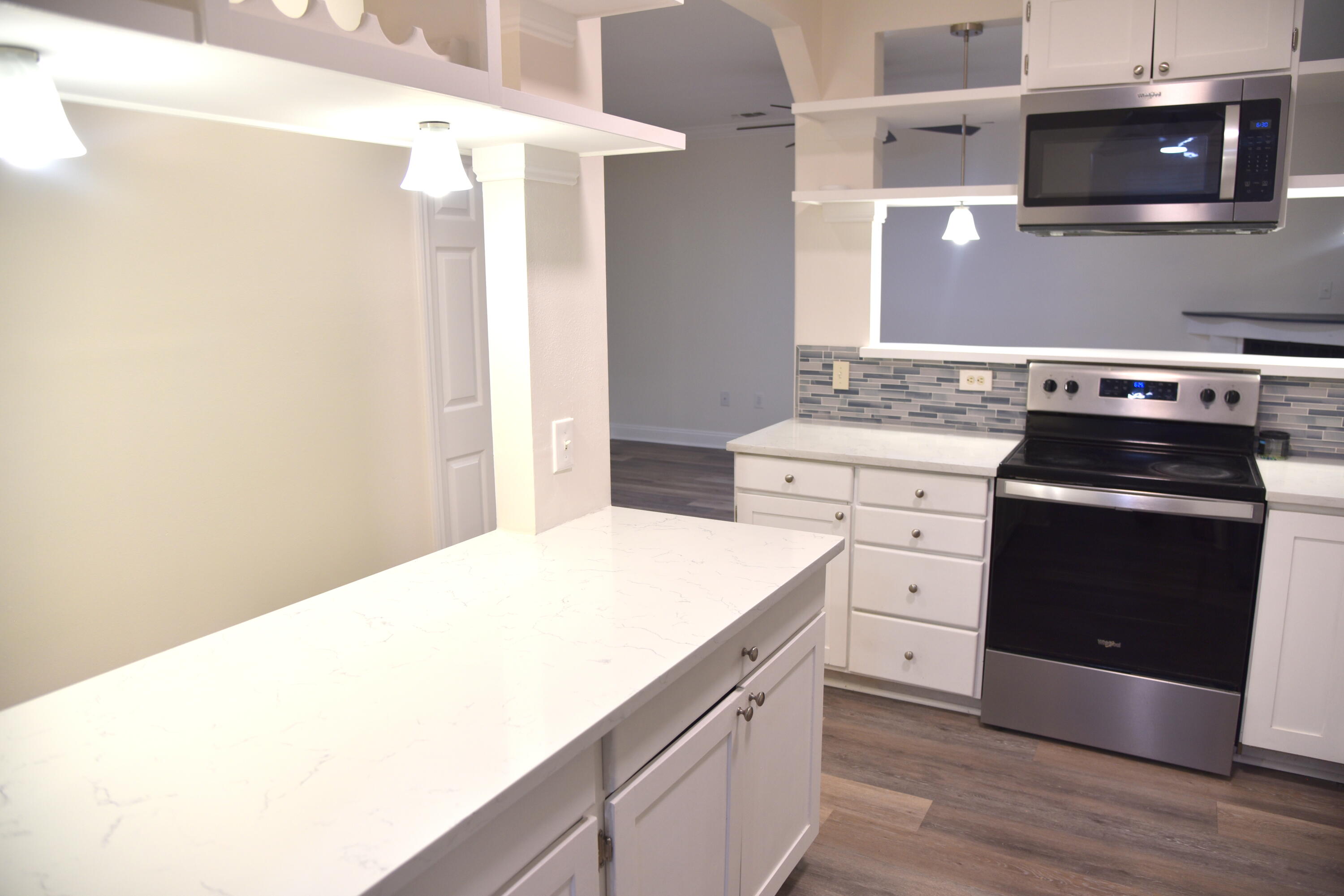 149 Legion Park Loop Miramar Beach, FL 32550 - Photo 26 of 89 a kitchen with a stove and a microwave