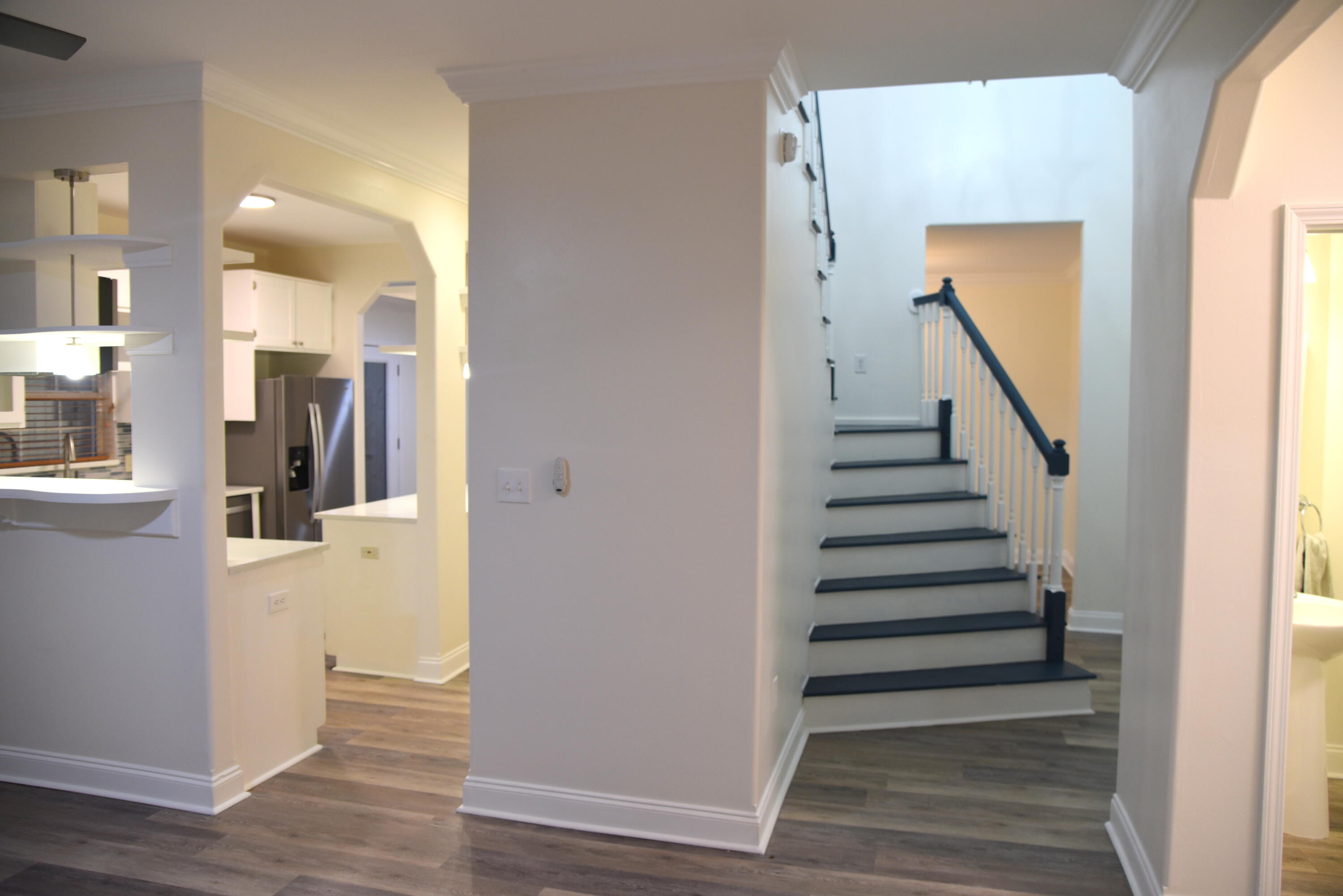 149 Legion Park Loop Miramar Beach, FL 32550 - Photo 43 of 89 a view of a hallway with wooden floor and entryway