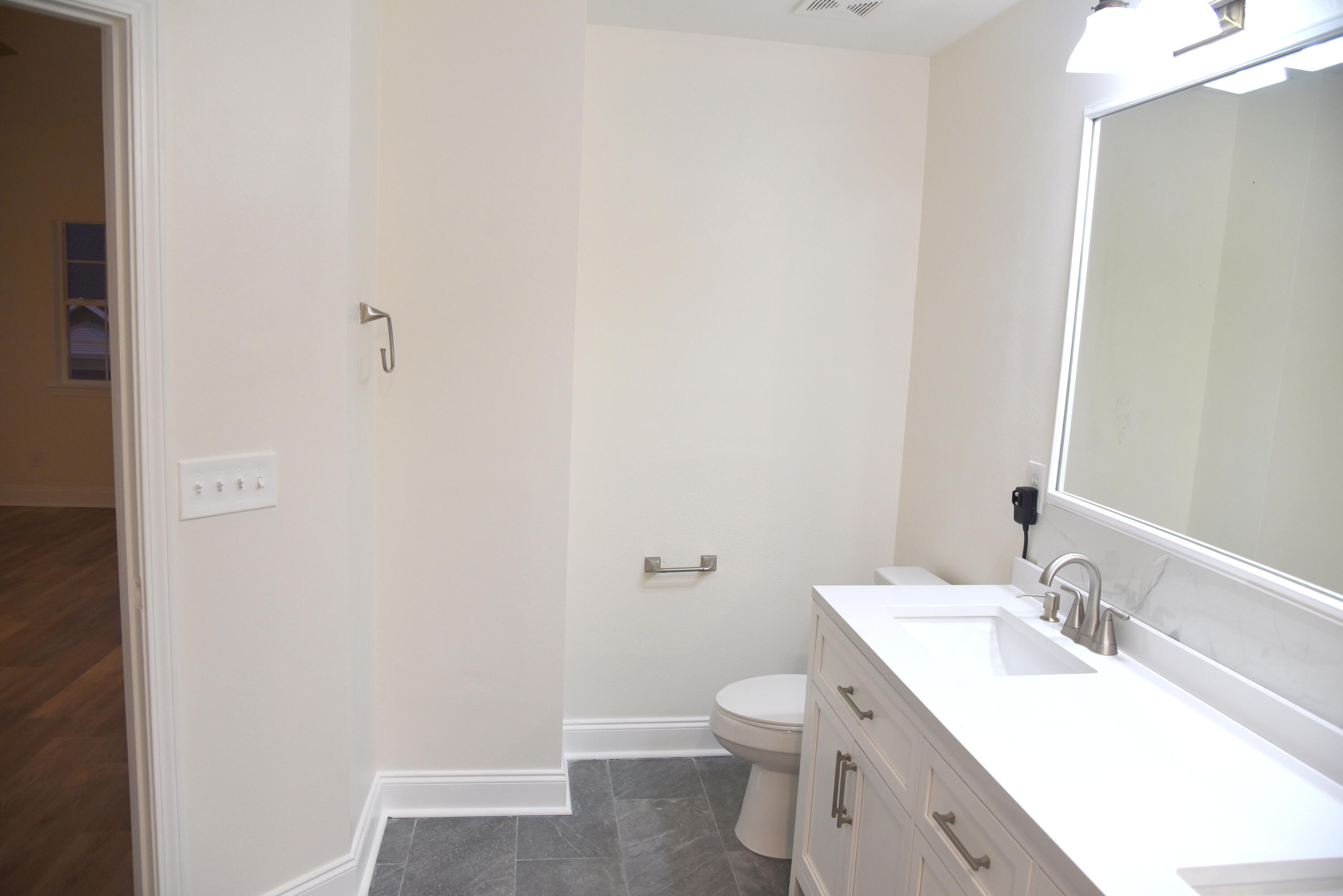 149 Legion Park Loop Miramar Beach, FL 32550 - Photo 71 of 89 a bathroom with a sink toilet and vanity