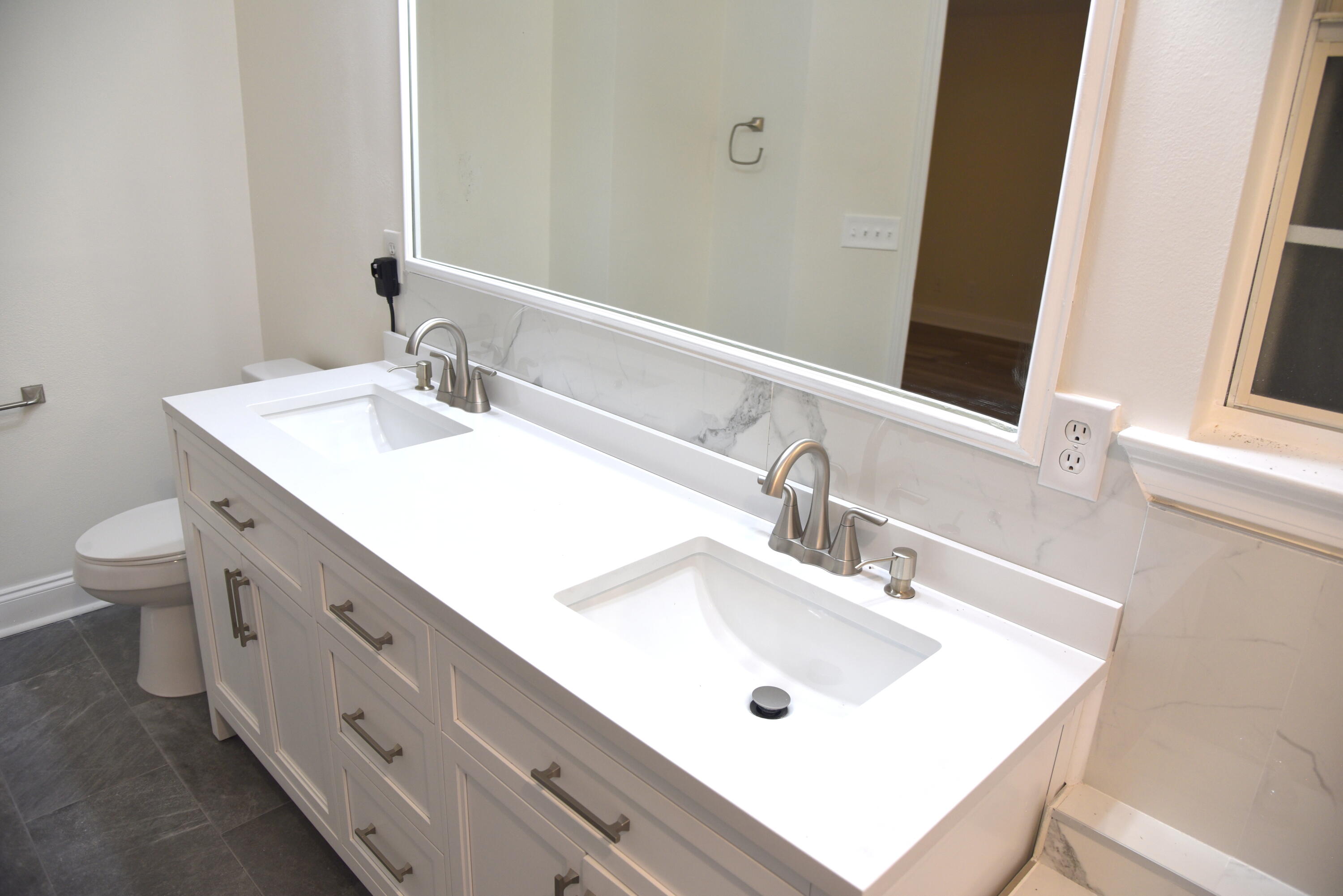 149 Legion Park Loop Miramar Beach, FL 32550 - Photo 72 of 89 a bathroom with a sink and a large mirror