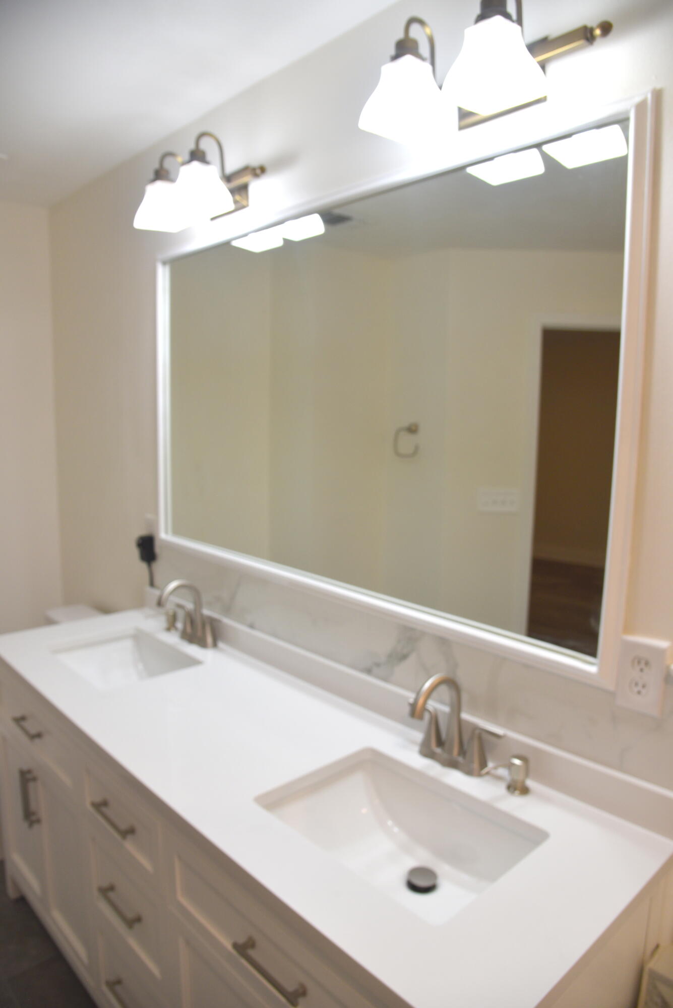 149 Legion Park Loop Miramar Beach, FL 32550 - Photo 73 of 89 a bathroom with a sink and a mirror
