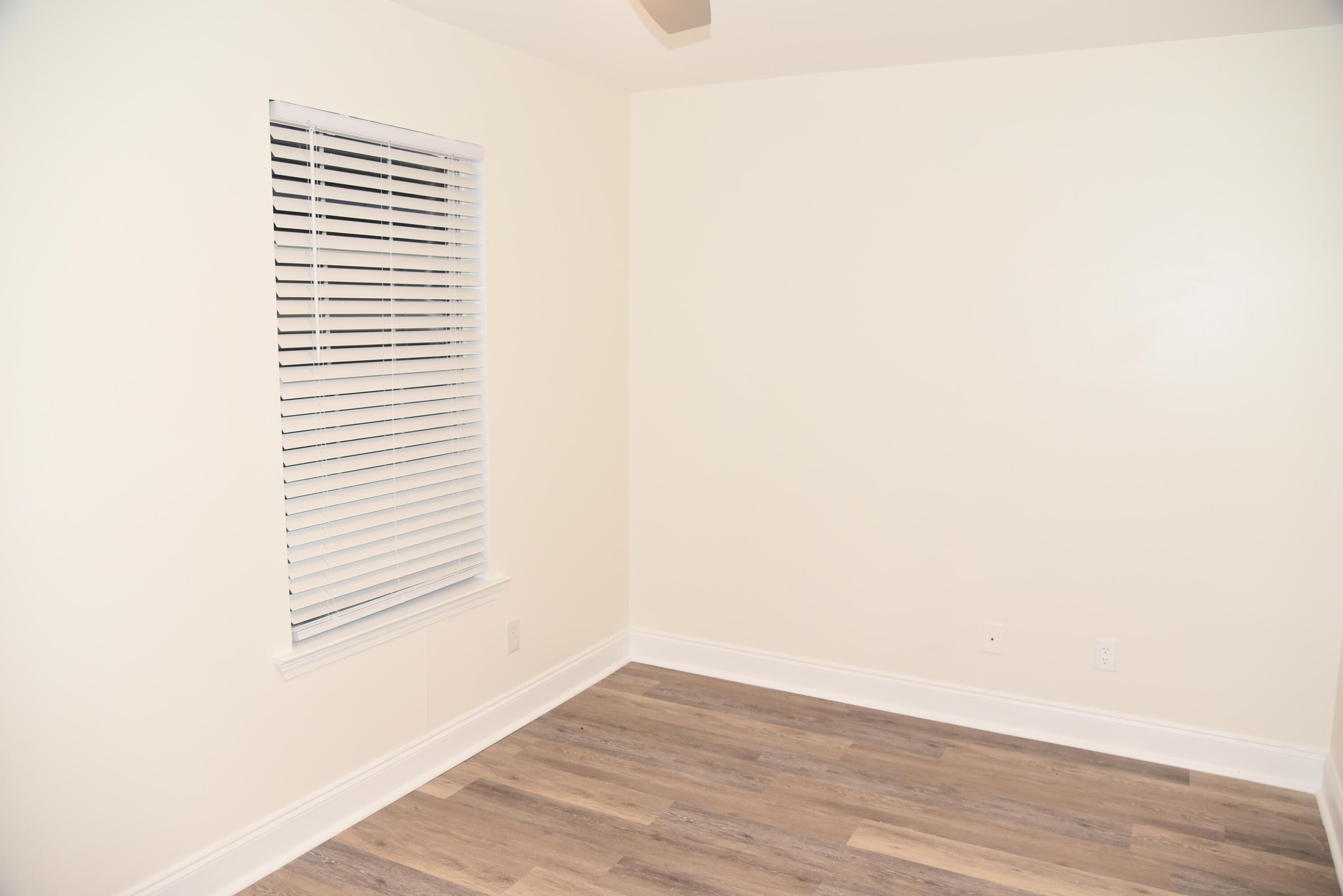 149 Legion Park Loop Miramar Beach, FL 32550 - Photo 87 of 89 a view of a small space with wooden floor and a window