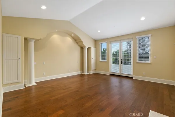 a view of a kitchen with furniture and a window