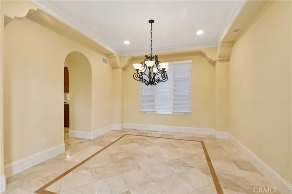 a view of a chandelier in a room