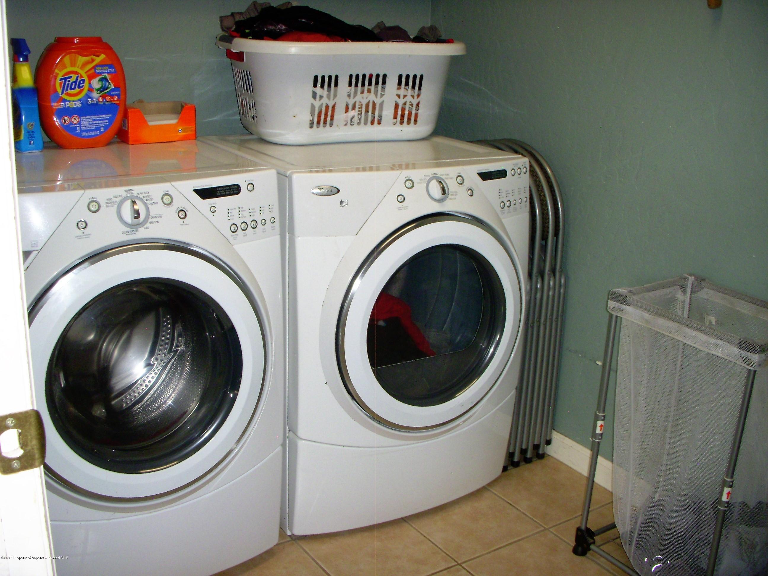 768 East 17th Street Rifle, CO 81650 - Photo 9 of 26 a utility room with dryer and washer