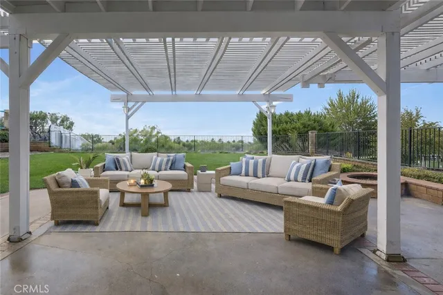 a outdoor living space with patio furniture and a garden