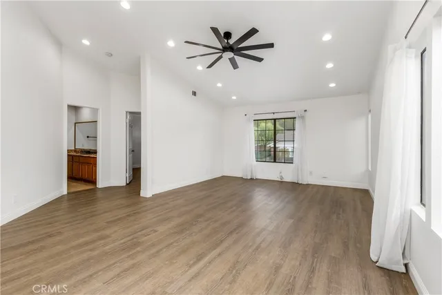 a front view of a house with a yard and porch