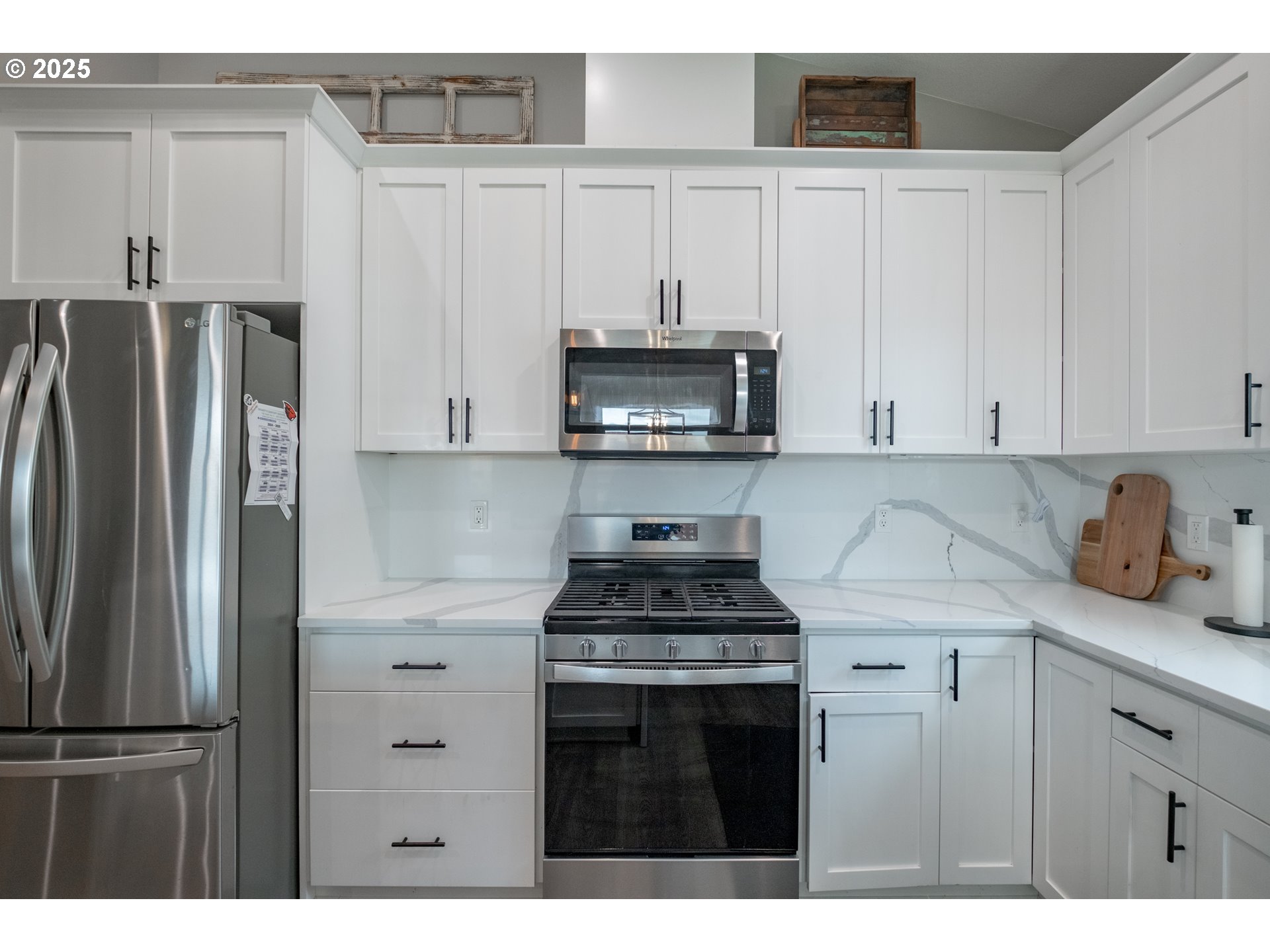 1006 Sassafras Street Independence, OR 97351 - Photo 15 of 47 a kitchen with granite countertop a stove sink and refrigerator
