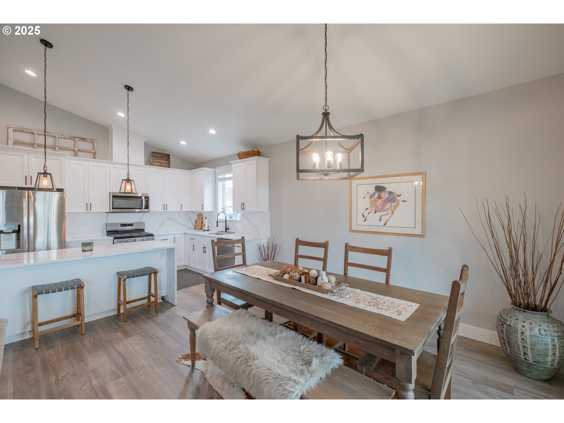 1006 Sassafras Street Independence, OR 97351 - Photo 20 of 47 a living room with kitchen island furniture and a kitchen view