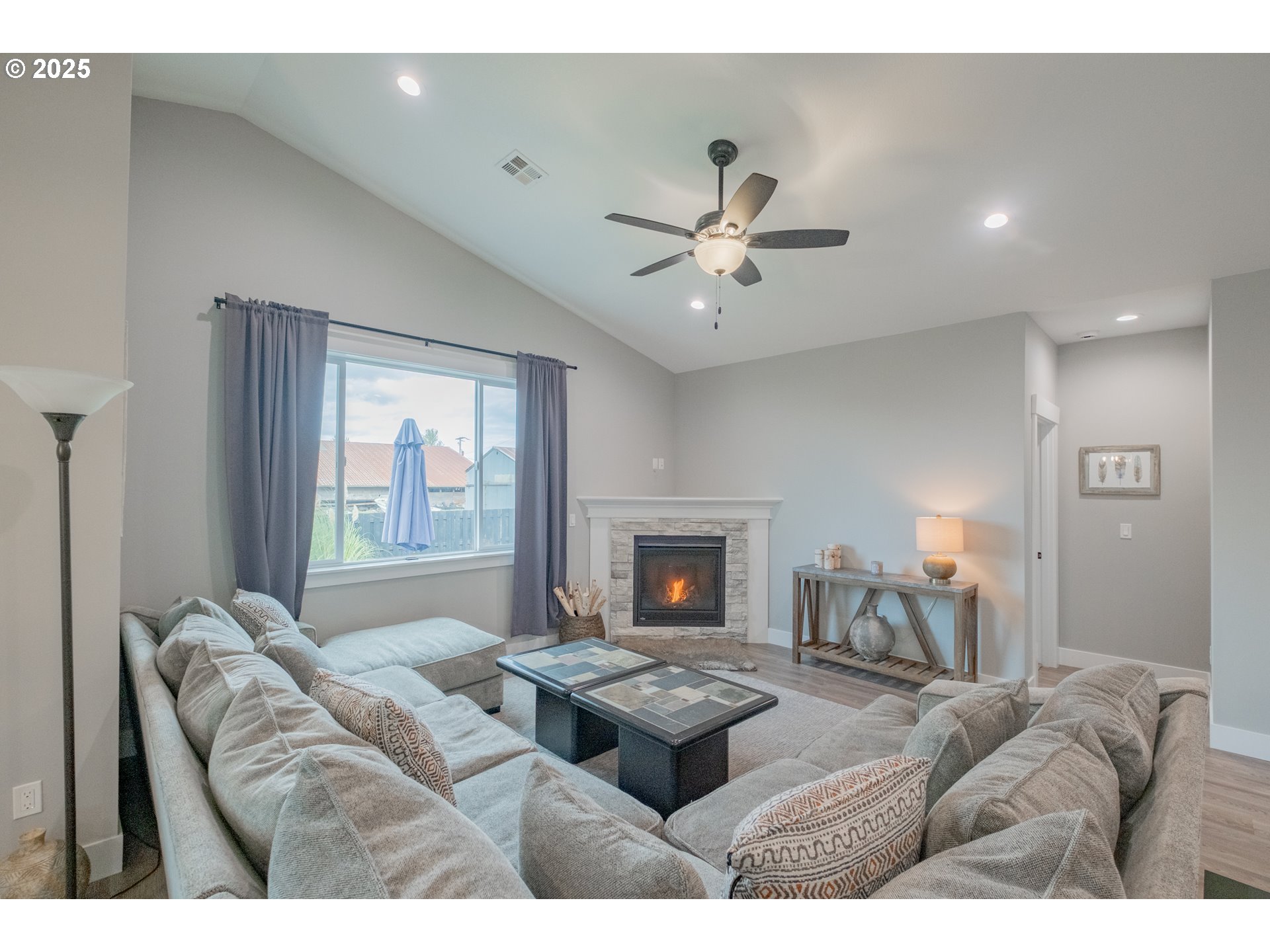 1006 Sassafras Street Independence, OR 97351 - Photo 21 of 47 a living room with furniture and a fireplace