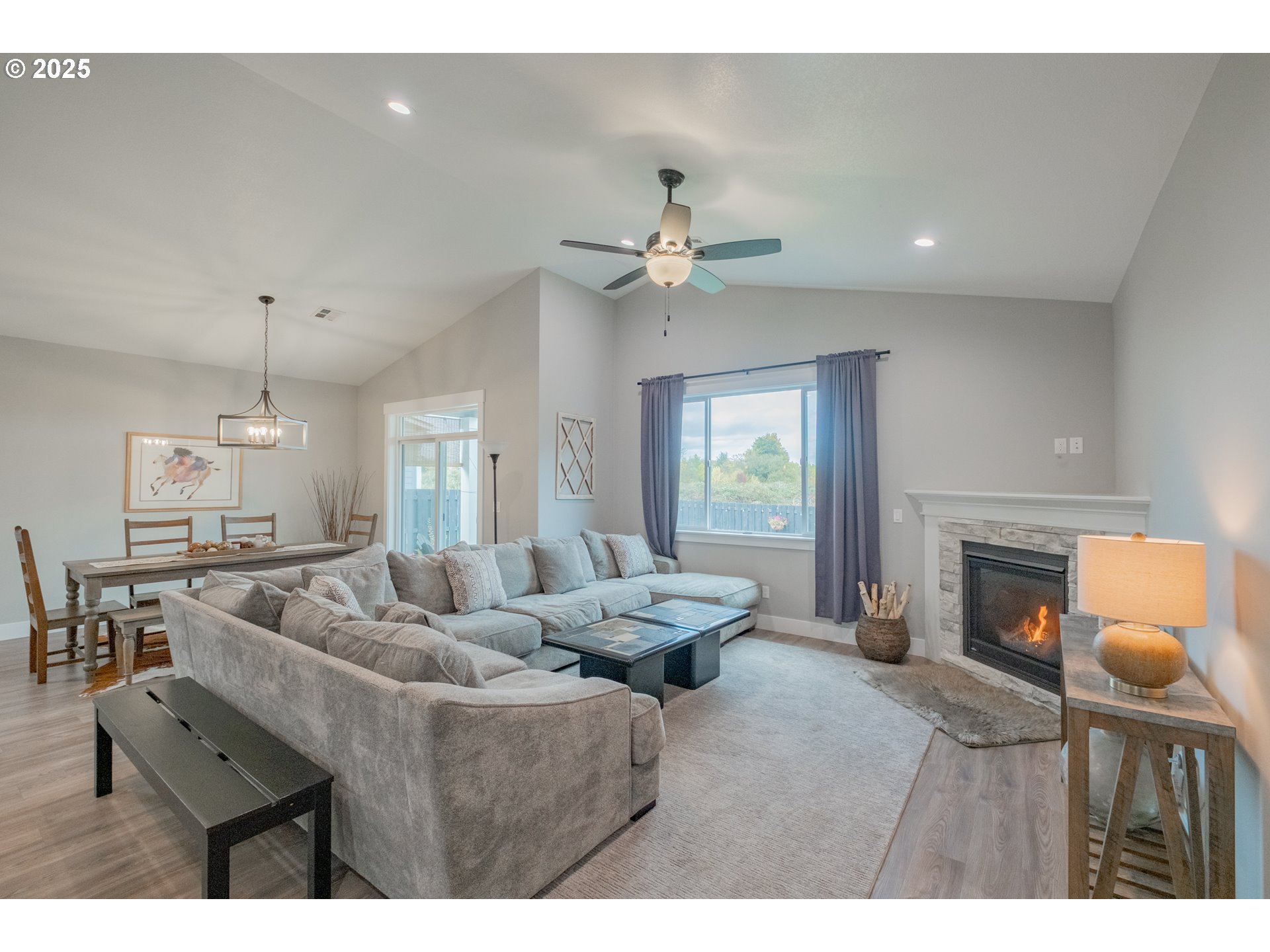 1006 Sassafras Street Independence, OR 97351 - Photo 22 of 47 a living room with furniture and a fireplace