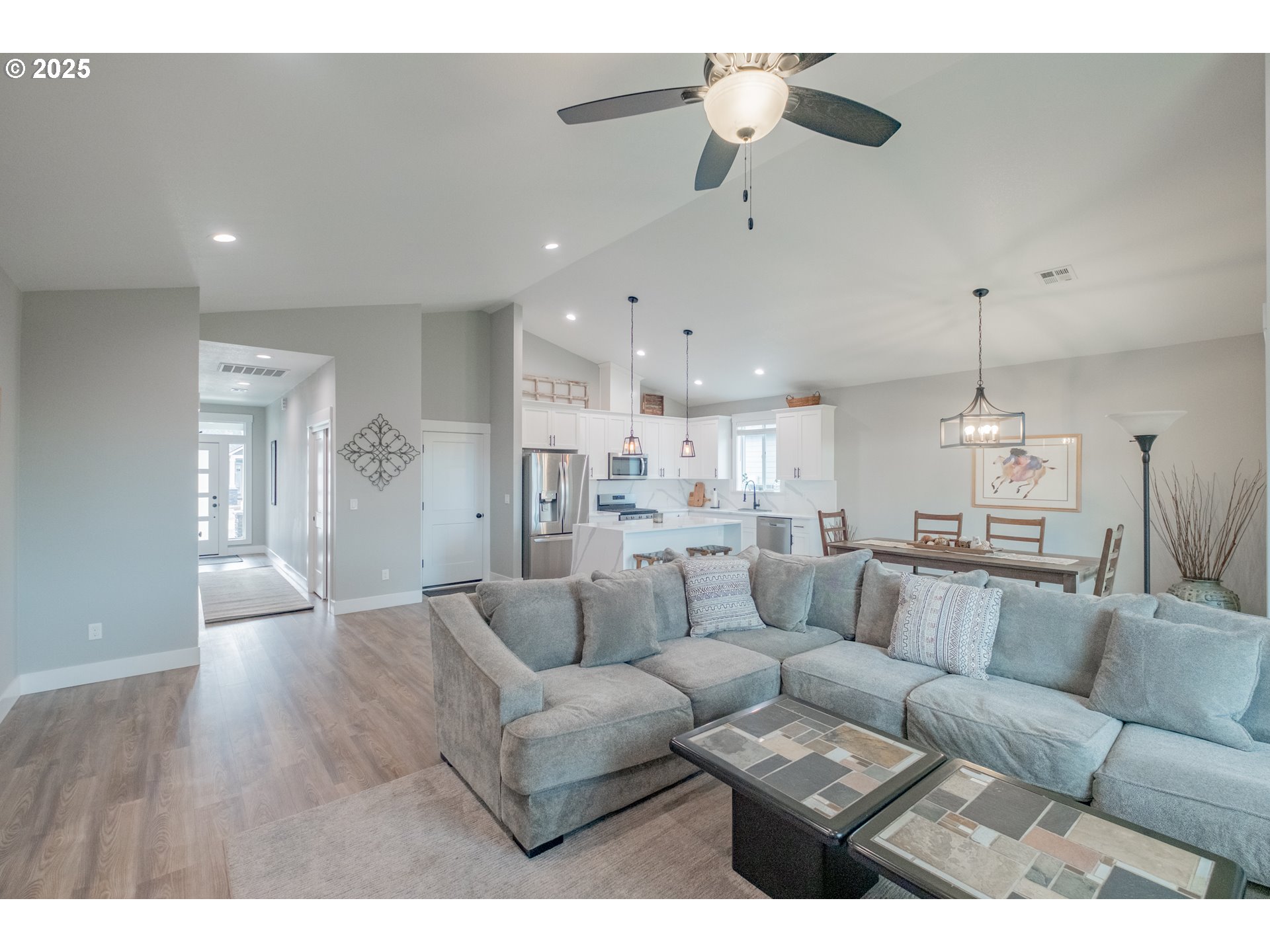 1006 Sassafras Street Independence, OR 97351 - Photo 23 of 47 a living room with furniture and a chandelier