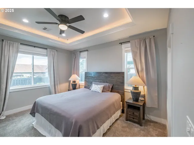 a bathroom with a double vanity sink and mirror