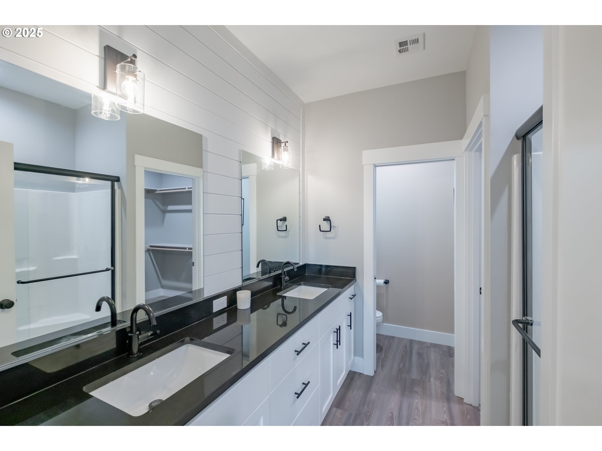 1006 Sassafras Street Independence, OR 97351 - Photo 28 of 47 a bathroom with a double vanity sink and mirror
