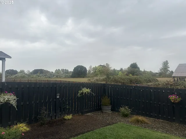 a view of a lake with a garden