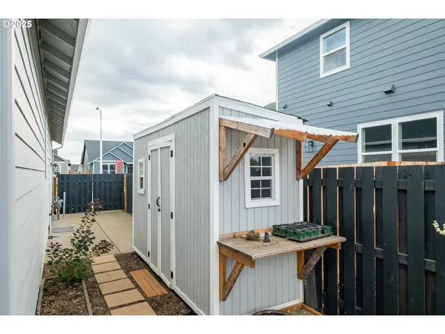 a view of a backyard with a garden