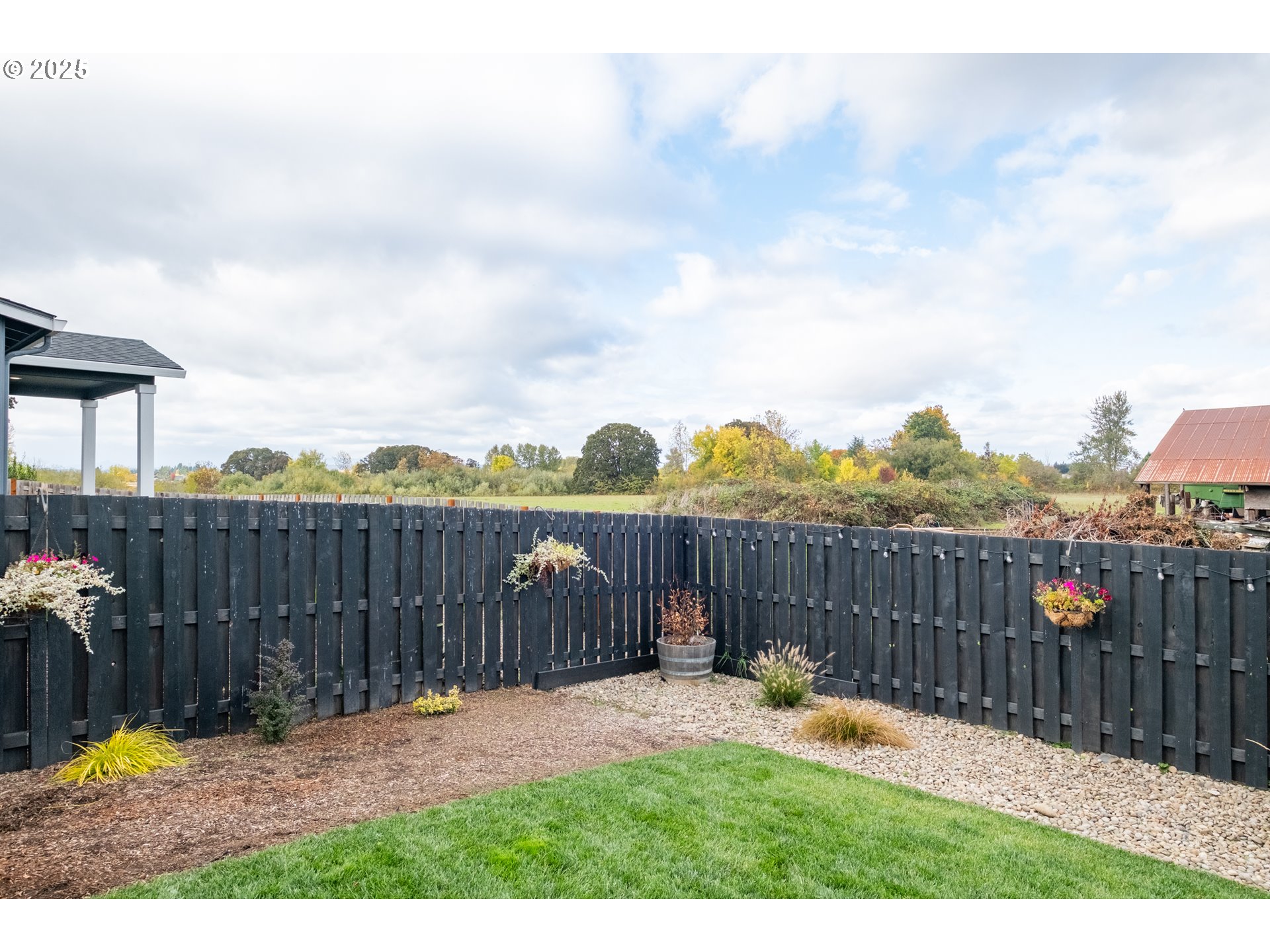 1006 Sassafras Street Independence, OR 97351 - Photo 46 of 47 a view of a backyard with a garden