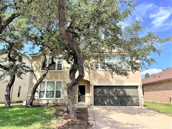 508 Tyree Road Cedar Park, TX 78613 - Photo 1 of 22 a front view of a house with a yard