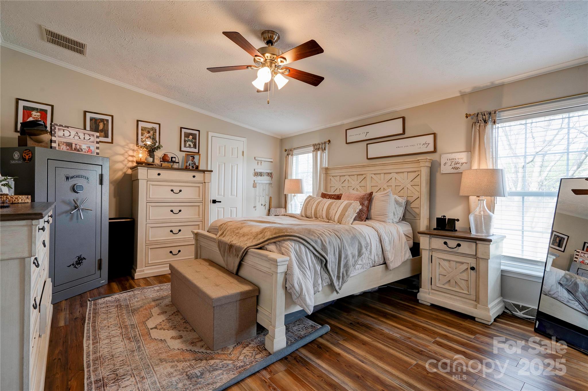 2002 Bachelor Road Mooresboro, NC 28114 - Photo 11 of 30 a bed room with a bed and a ceiling fan