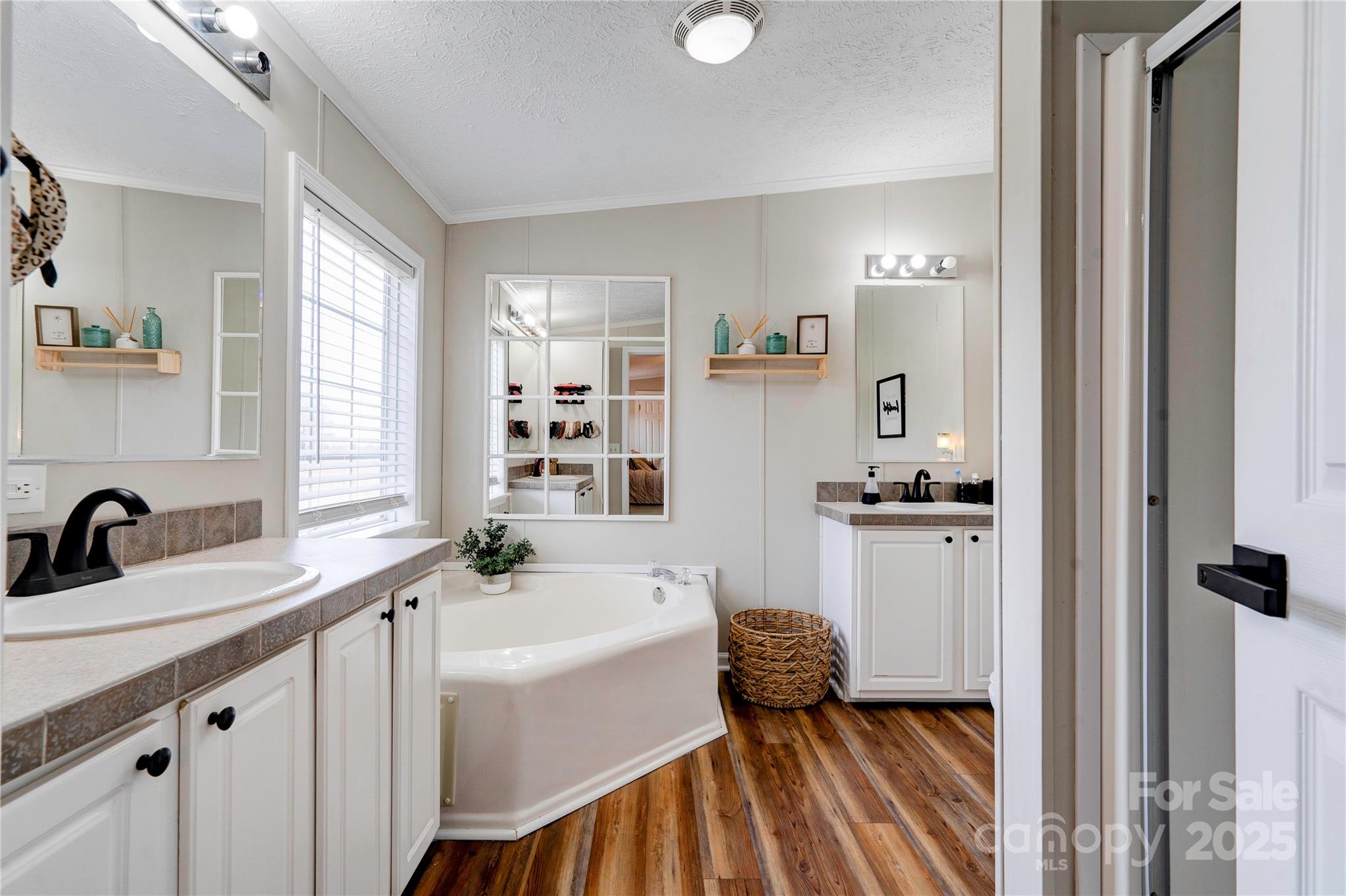 2002 Bachelor Road Mooresboro, NC 28114 - Photo 13 of 30 a kitchen with a sink a window and cabinets