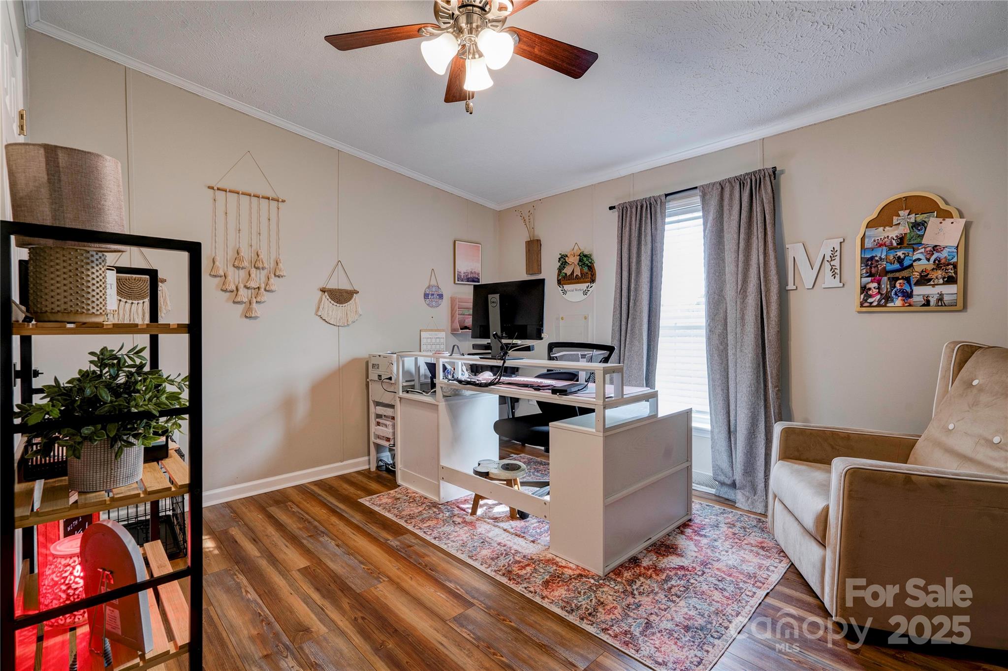2002 Bachelor Road Mooresboro, NC 28114 - Photo 22 of 30 a living room with furniture and a flat screen tv