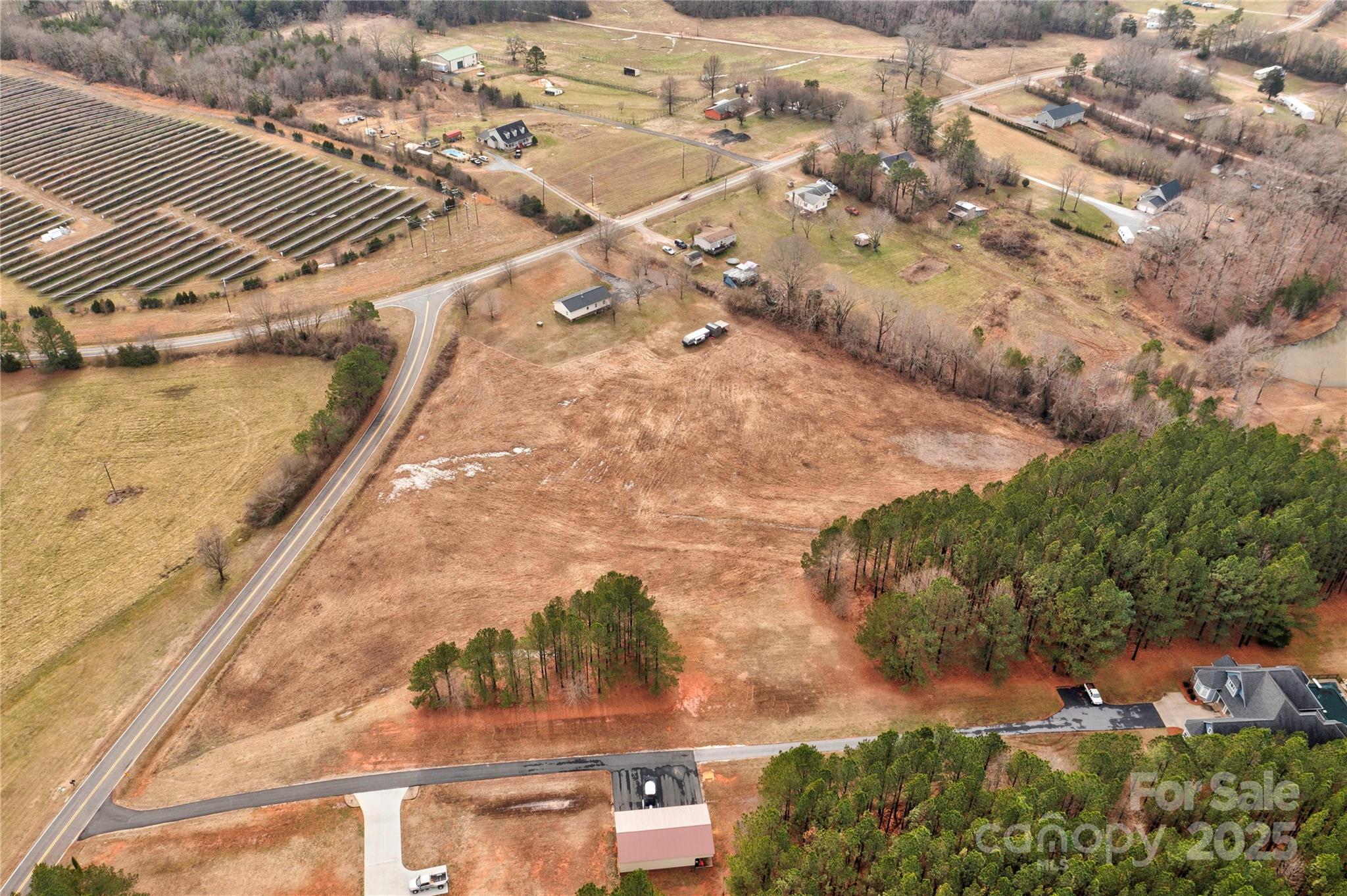 2002 Bachelor Road Mooresboro, NC 28114 - Photo 27 of 30 an aerial view of residential houses with outdoor space