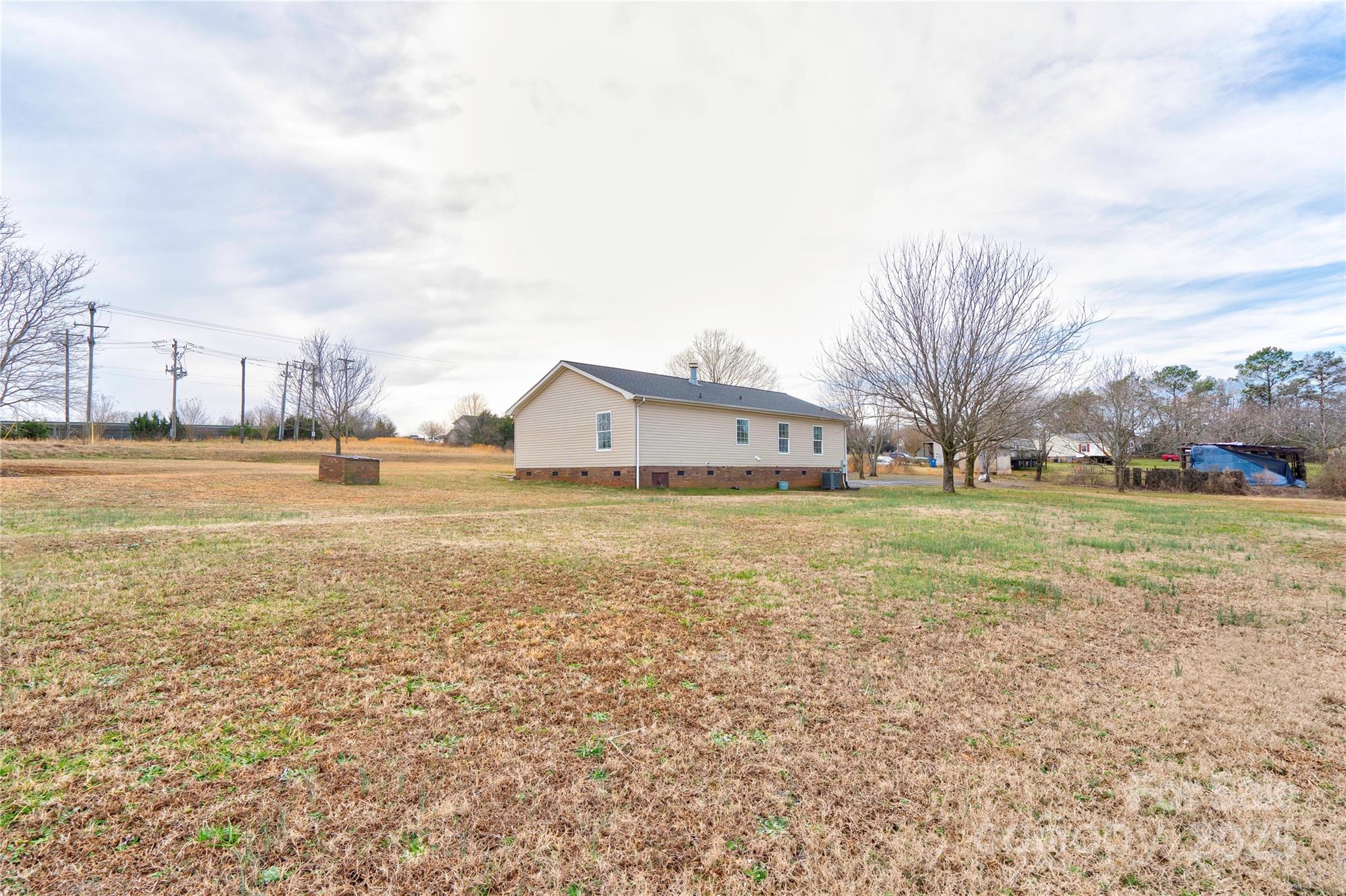 2002 Bachelor Road Mooresboro, NC 28114 - Photo 29 of 30 a front view of house with yard and trees