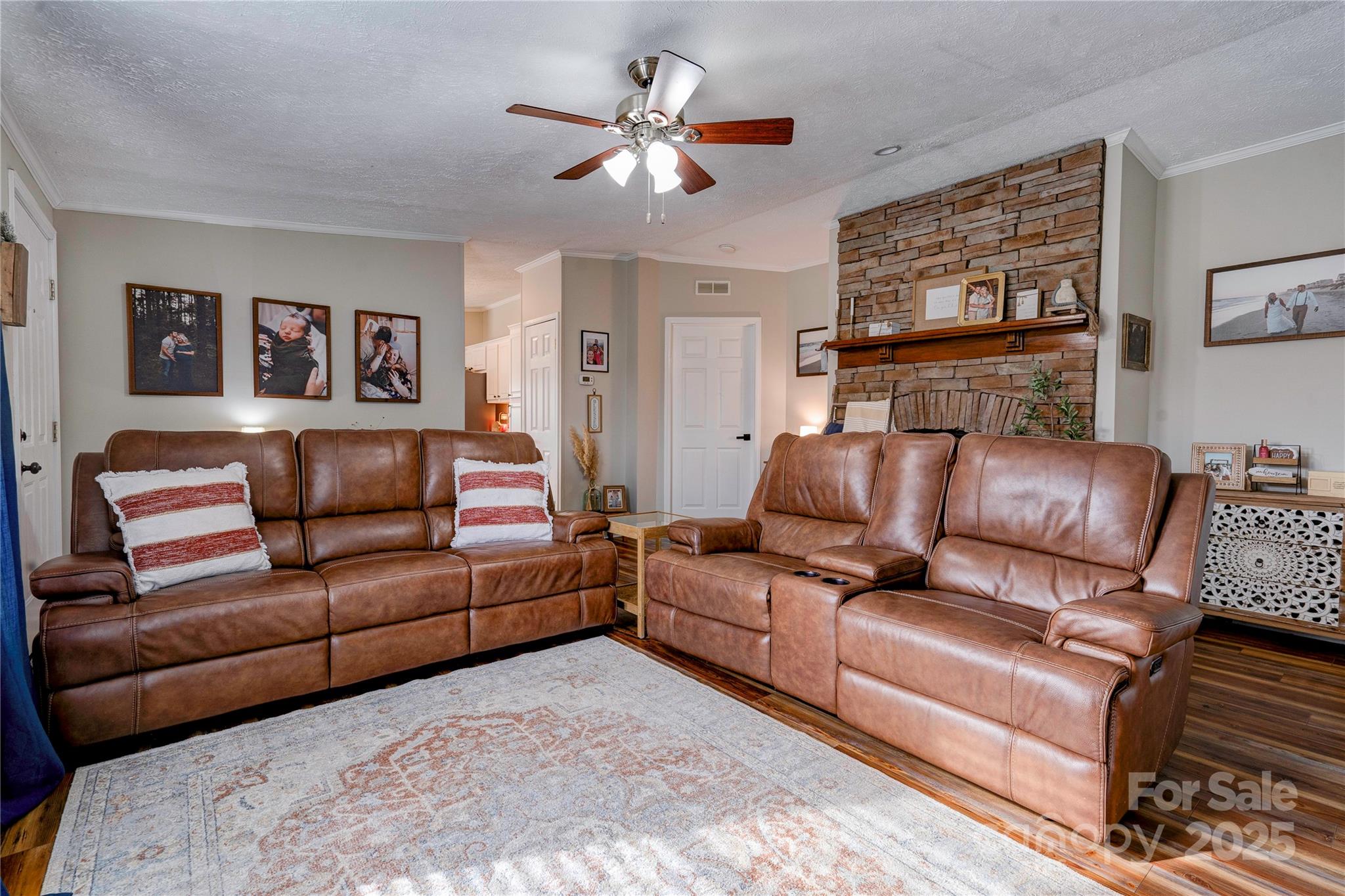 2002 Bachelor Road Mooresboro, NC 28114 - Photo 10 of 30 a living room with furniture and a ceiling fan