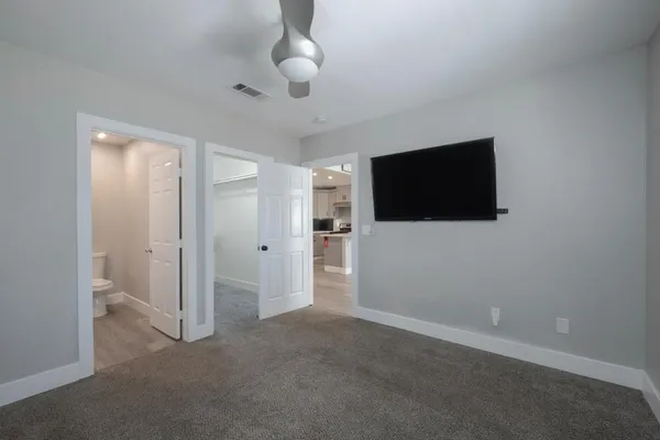 a view of a livingroom with a flat screen tv