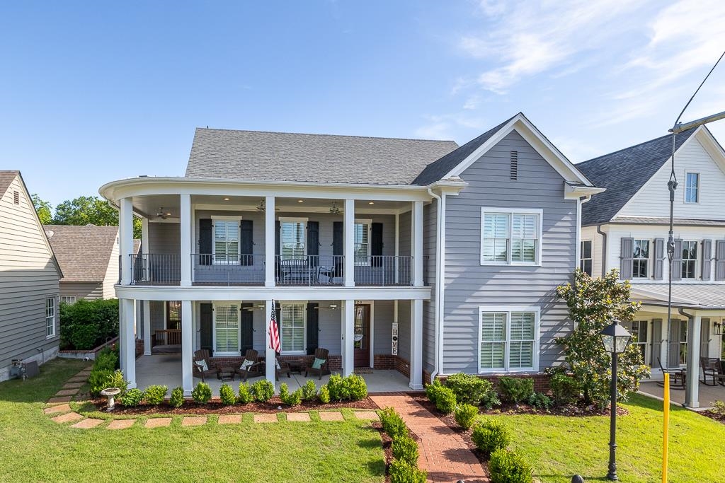 328 Washington Street Collierville, TN 38017 - Photo 3 of 33 Two-story home with a prominent curved second-story balcony