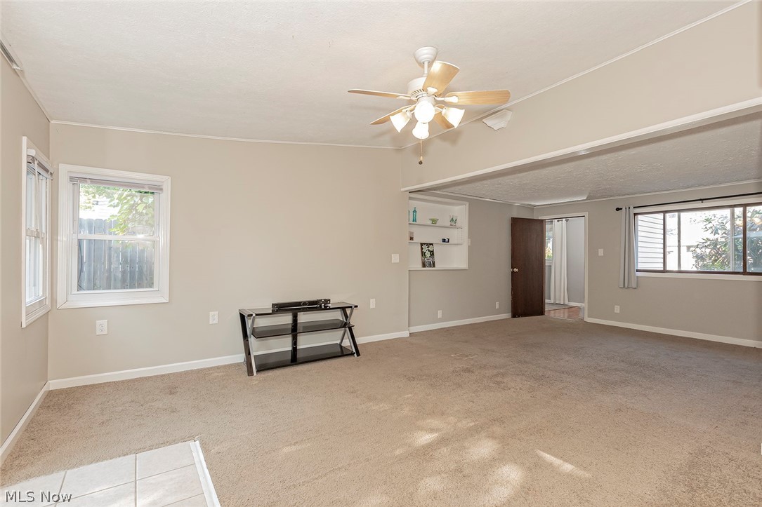 6263 Seneca Road Mentor, OH 44060 - Photo 11 of 31 The oversized family room with tiered ceiling.