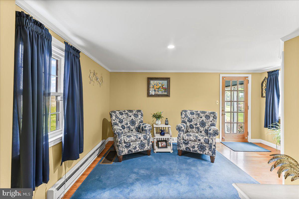 1439 Middletown Road Glen Mills, PA 19342 - Photo 16 of 45 a view of front door with furniture and large window