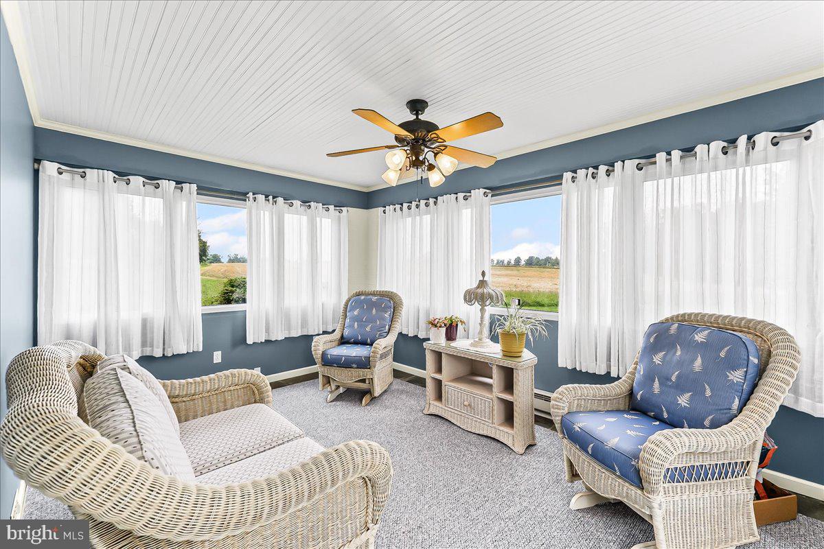 1439 Middletown Road Glen Mills, PA 19342 - Photo 19 of 45 a living room with furniture and a large window
