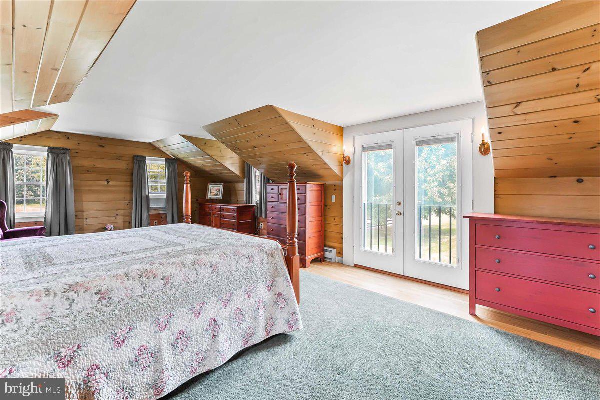 1439 Middletown Road Glen Mills, PA 19342 - Photo 25 of 45 a bedroom with a bed and a dresser next to a window