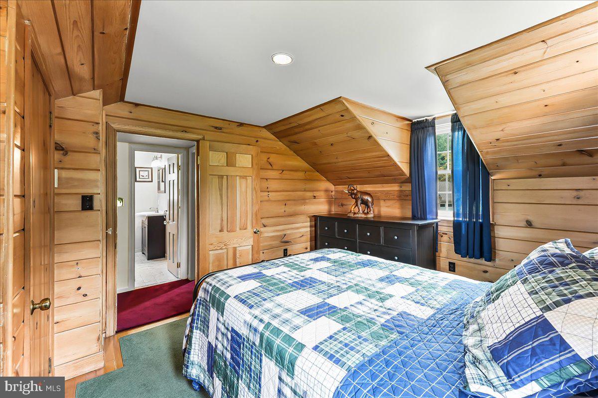 1439 Middletown Road Glen Mills, PA 19342 - Photo 27 of 45 a bedroom with a bed and a dresser