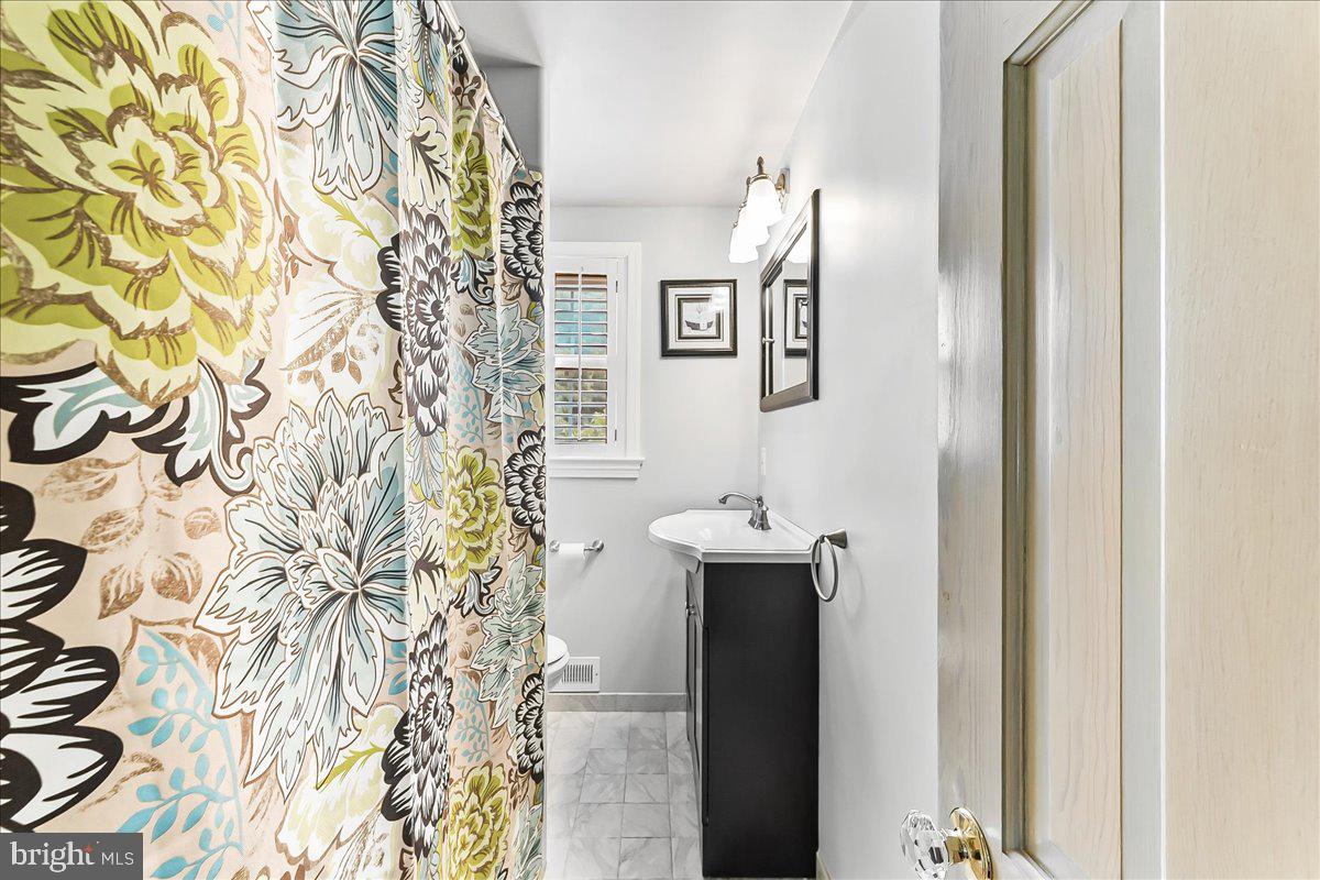 1439 Middletown Road Glen Mills, PA 19342 - Photo 30 of 45 a bathroom with a shower and a sink