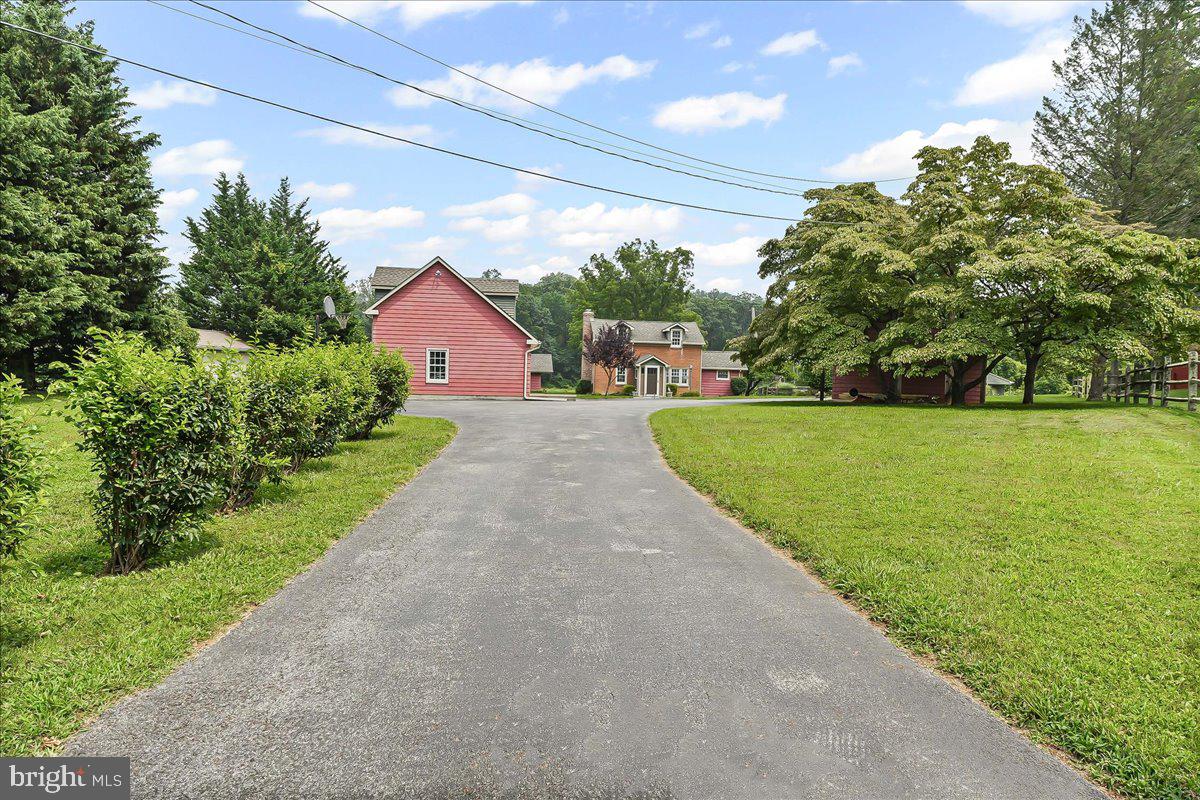 1439 Middletown Road Glen Mills, PA 19342 - Photo 3 of 45 a front view of a house with yard