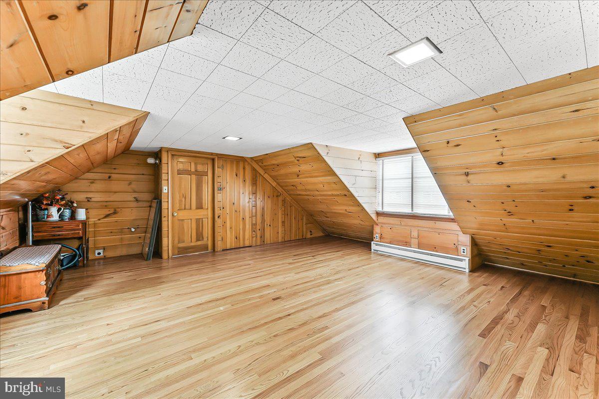 1439 Middletown Road Glen Mills, PA 19342 - Photo 35 of 45 a view of a hallway with wooden floor