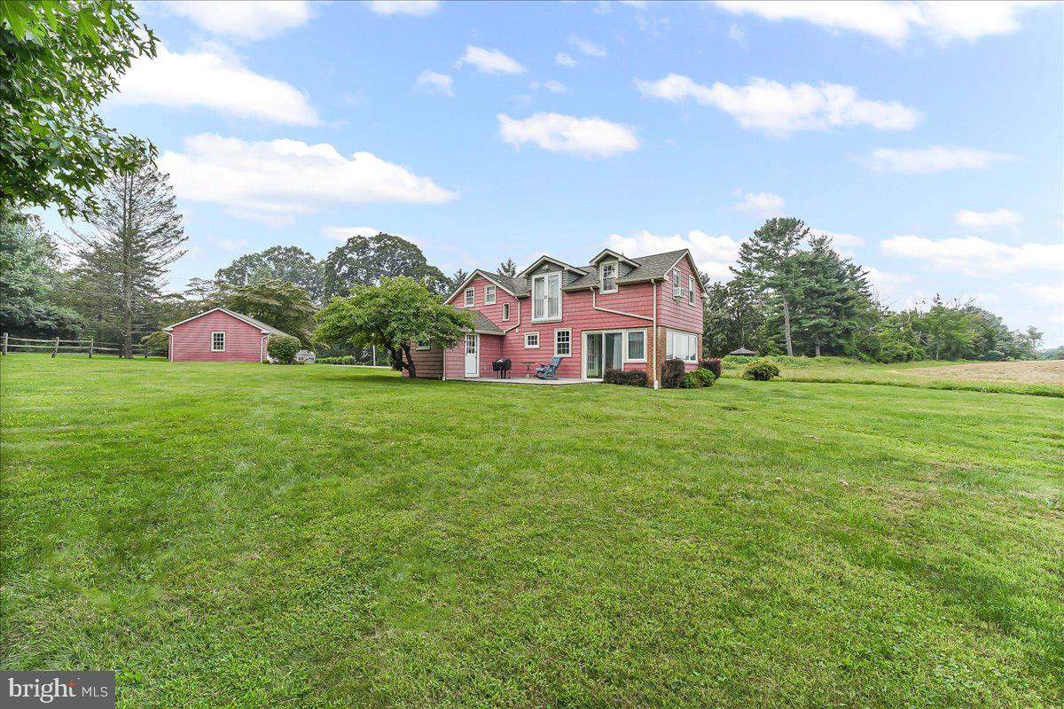 1439 Middletown Road Glen Mills, PA 19342 - Photo 42 of 45 a view of a house with a big yard and large trees