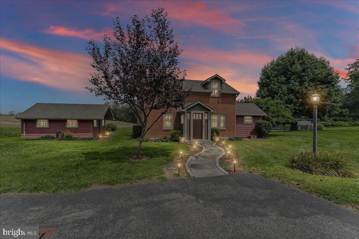 1439 Middletown Road Glen Mills, PA 19342 - Photo 45 of 45 a front view of a house with a yard and trees