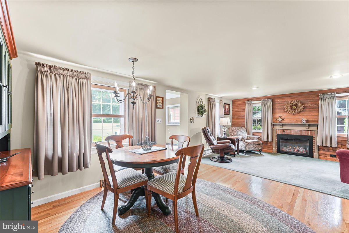 1439 Middletown Road Glen Mills, PA 19342 - Photo 9 of 45 a dining room with furniture and fireplace