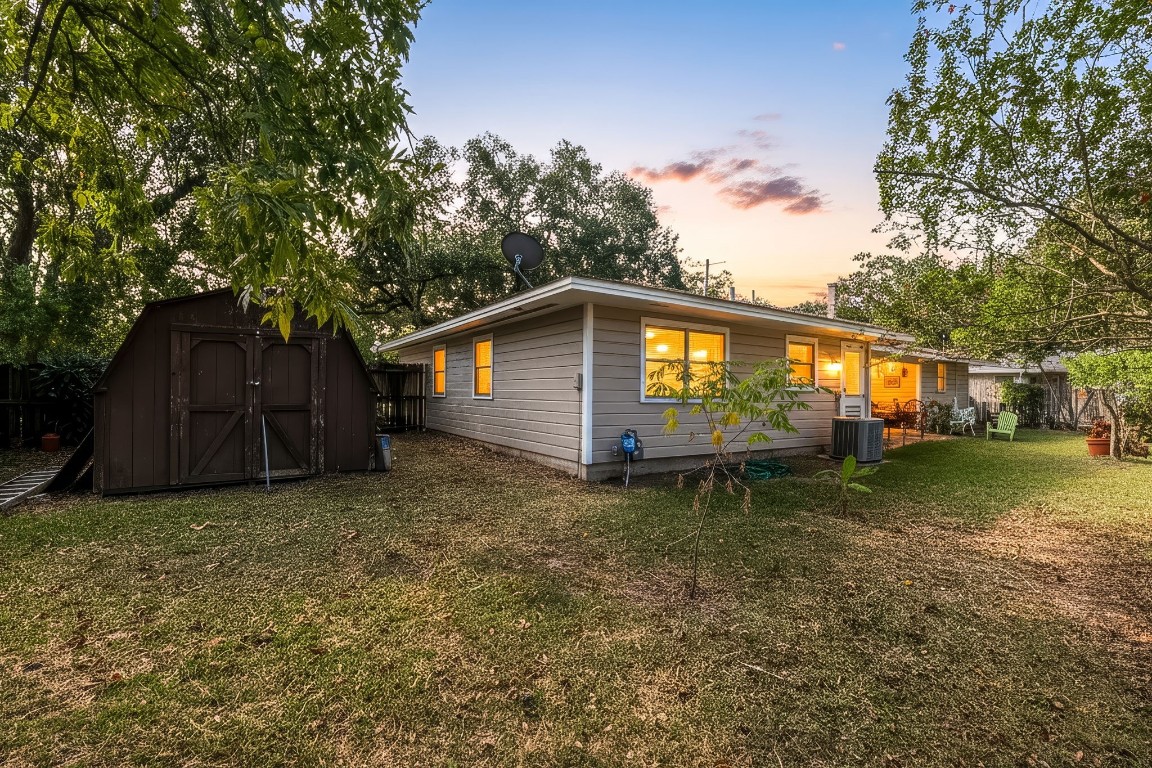 1811 Myrtle Street Liberty, TX 77575 - Photo 16 of 18 a house view with a garden space