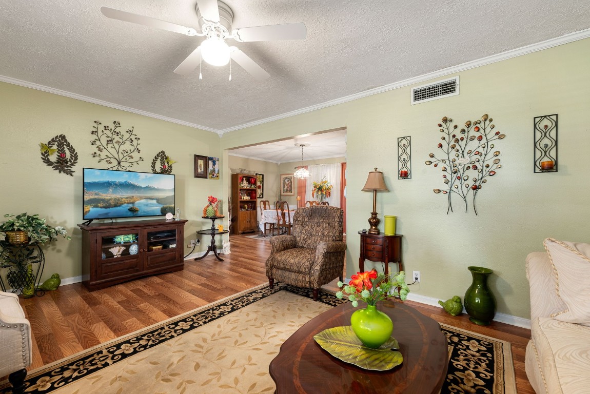 1811 Myrtle Street Liberty, TX 77575 - Photo 2 of 18 a living room with furniture and a fireplace