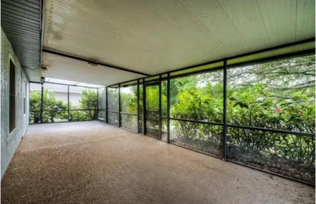 an empty room with windows